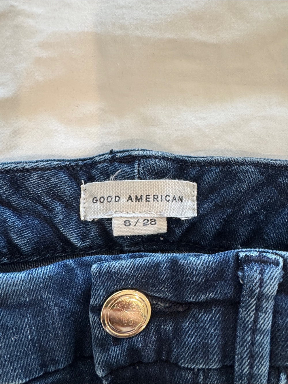 Good Americans Dark Indigo Skinny Jeans with Gold Button